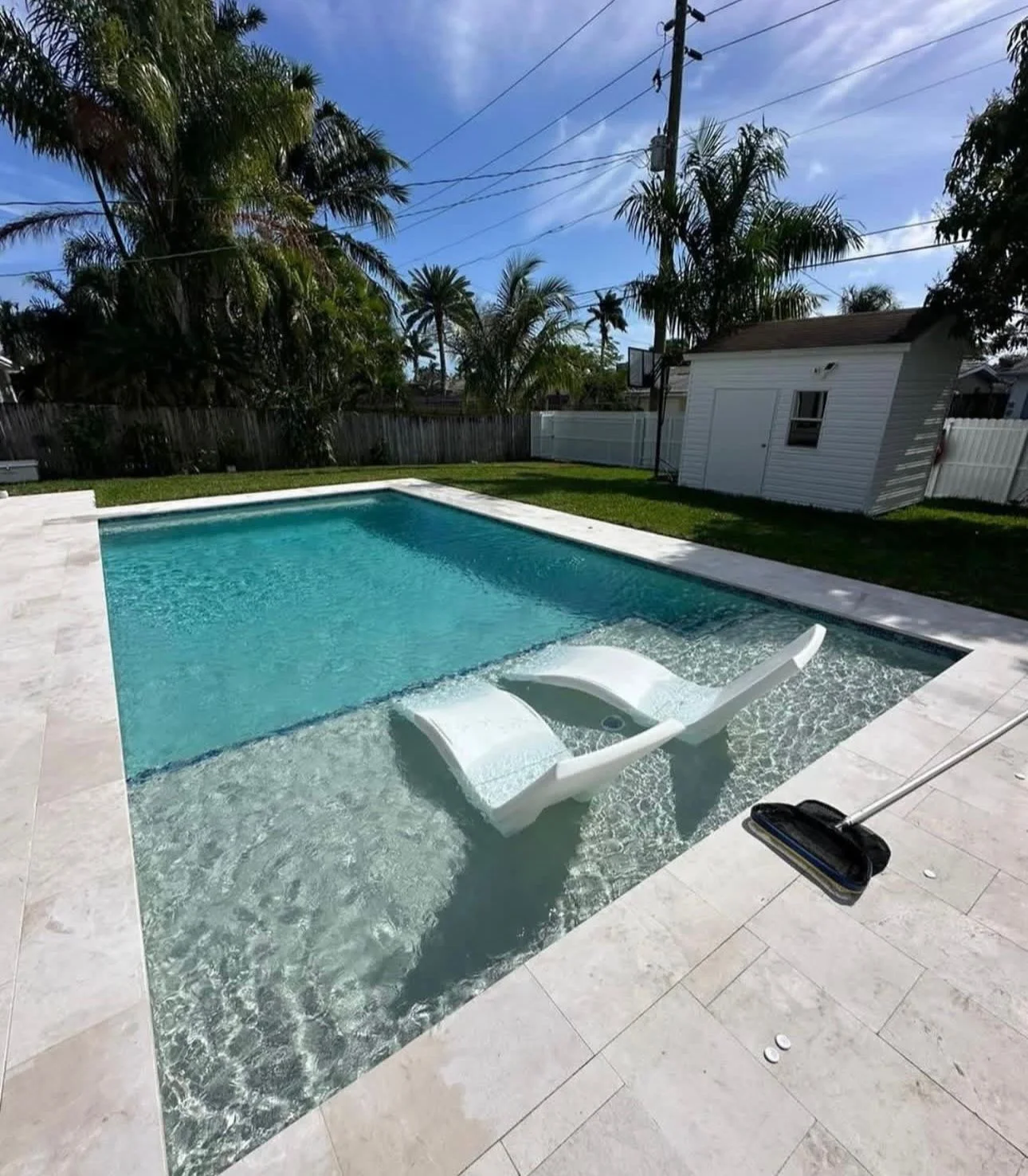 Pool with shallow lounging area — Moncada project gallery